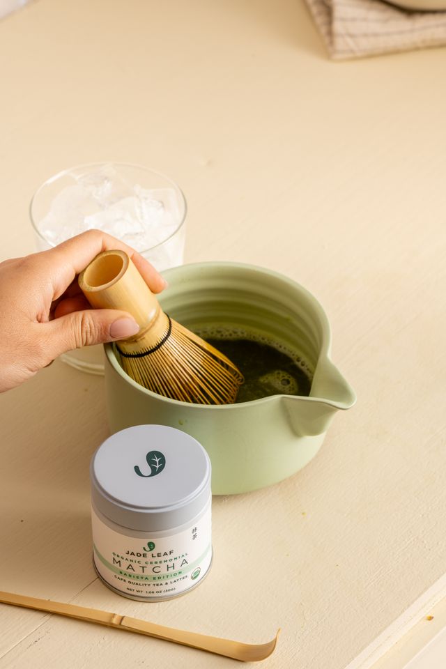 Ceremonial Matcha Starter Bundle with organic matcha tin, bamboo whisk, scoop, sifter, and matcha handbook