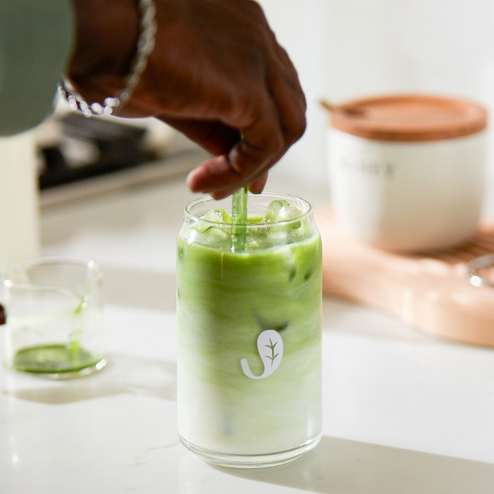 POS Organic Cafe Style Sweetened Matcha Latte Mix Original packaging with matcha latte drink and green tea leaves