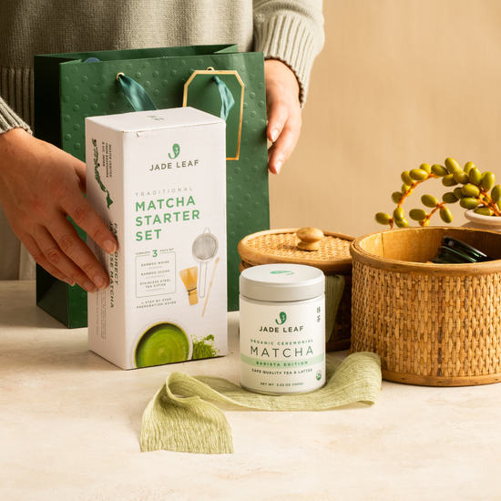 Jade Leaf matcha starter set with packaging and container on a neutral background